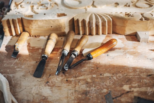Preview: The carpenter works with a tree