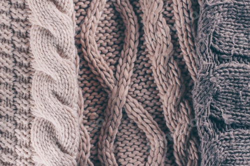 Preview: Knitting wool texture background. Cozy sweaters concept