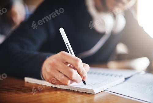 Preview: Cropped shot of an unrecognizable male university student in class