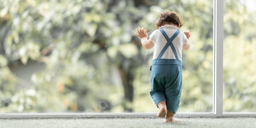 Preview: cute toddler little child family concept, baby learning to walk with father and mother to help care
