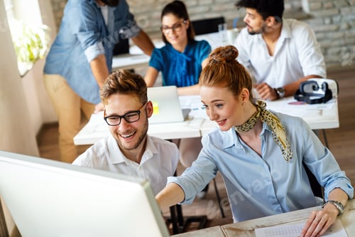 Preview: Programmers working in a software developing company office. Business people as a team