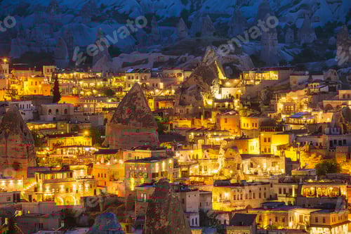 Preview: Goreme, Cappadocia, Turkey. View of the evening city from the mountain. Bright evening city.