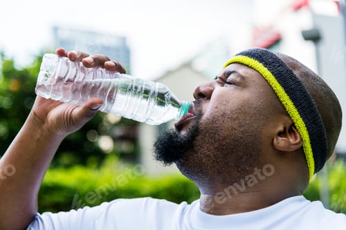 Preview: Man having an outdoor shower