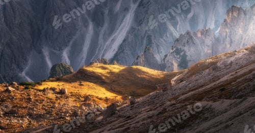 Preview: Mountain canyon lighted with bright sunbeam at sunset. Autumn