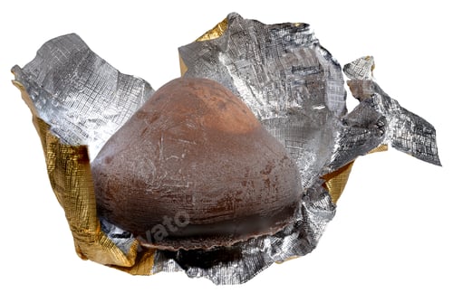Preview: Chocolate cone-shaped truffle candy in unwrapped golden silver foil