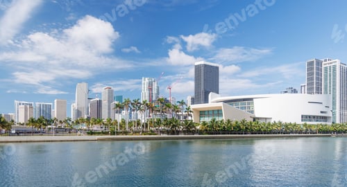 Preview: Modern skyline of Miami with towering skyscrapers, tropical vibe, and waterfront views