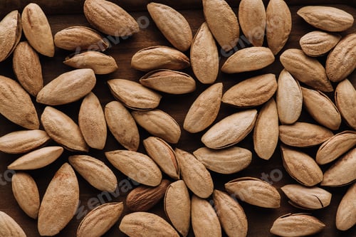 Preview: Top view of tasty almonds in full screen