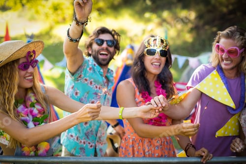 Preview: Group of friends dancing at music festival
