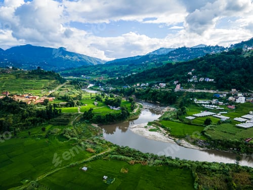 Preview: Aerial view of green paddy farmland in Nepal.