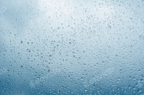 Preview: Drops of rain on the window glass Shallow DOF. Window after rain. Blue Water background with water