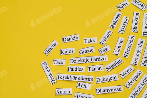 Preview: Thank you in many different languages arranged in a heart.