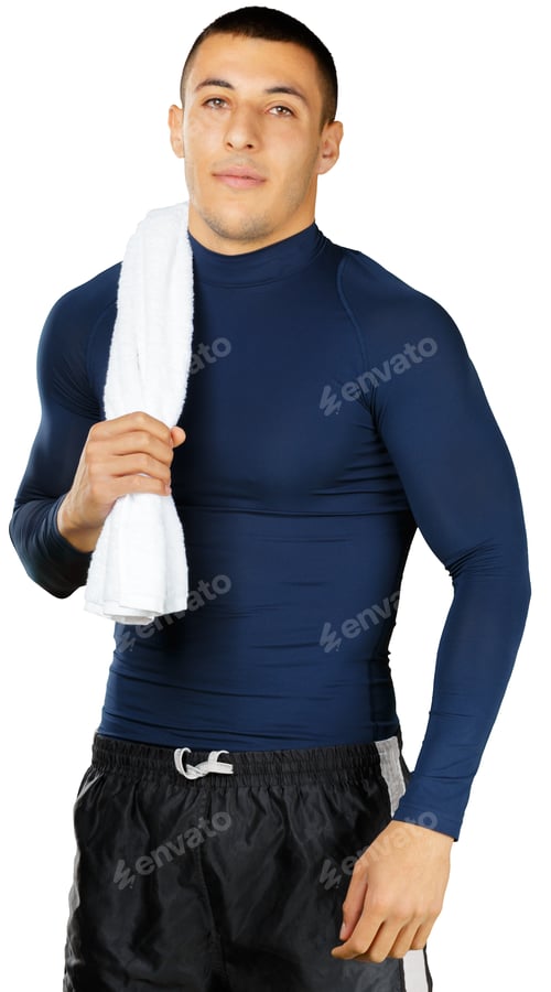 Preview: Man preparing for workout with towel in hand in indoor gym setting
