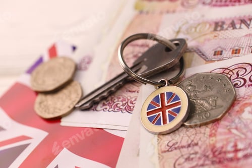 Preview: UK money bills and key for house close up. Big amount of United Kingdom pounds