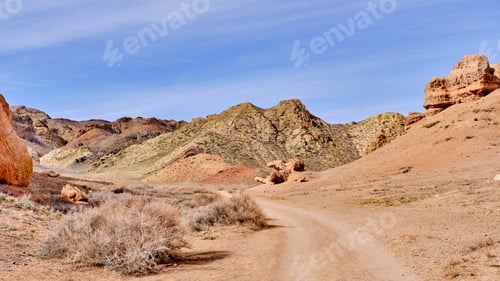 Preview: Road among colored sand of hills in Charyn Canyon National Park in Kazakhstan.