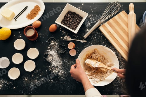 Preview: Beautiful woman Preparing Cookies And Muffins
