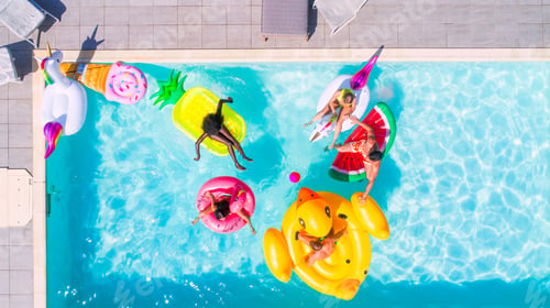 Preview: Friends having fun in a swimming pool