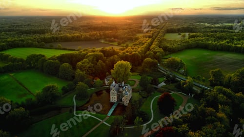 Preview: Aerial shot of a sunset over the Dutch castle in Ruurlo, Gelderland, the Netherlands.