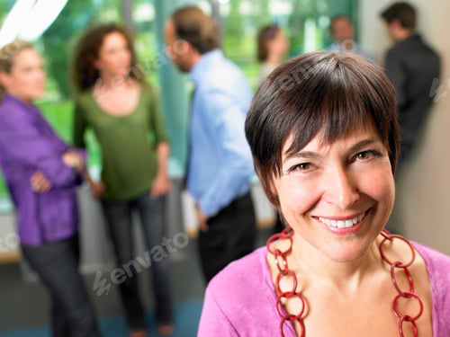 Preview: Business woman in the office, smiling