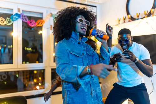 Preview: Two men singing karaoke in a night home party