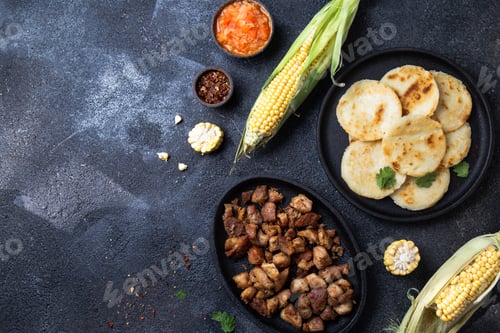 Preview: Colombian Food. Maize Arepas And Fried Pork Chicharon