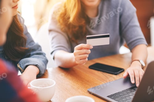 Preview: Three young asian people use credit card to purchasing and shopping online