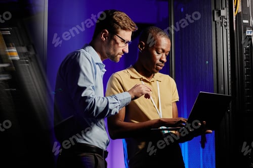 Preview: Network Technicians Using Laptop