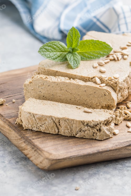 Preview: Sunflower halva close-up. Sweet oriental dessert halva. Sweets for tea.