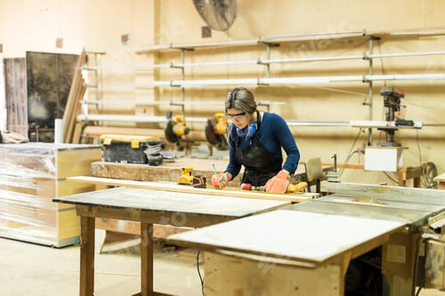 Preview: Female carpenter doing some work