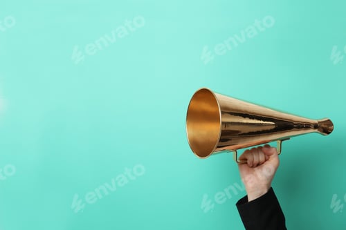 Preview: Woman holding retro megaphone on color background