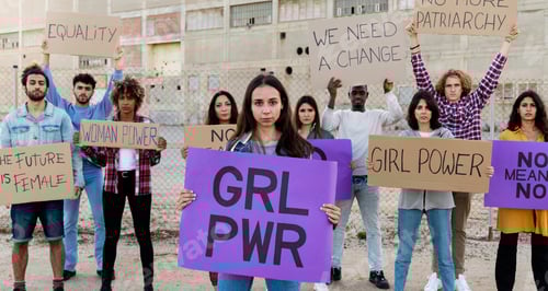 Preview: Group Holds Protest Signs for Equality and Women