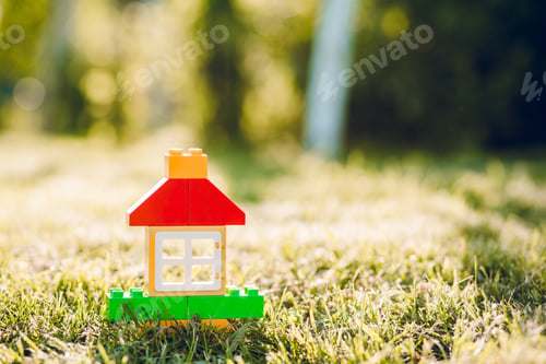Preview: A toy house of little boy in summer garden