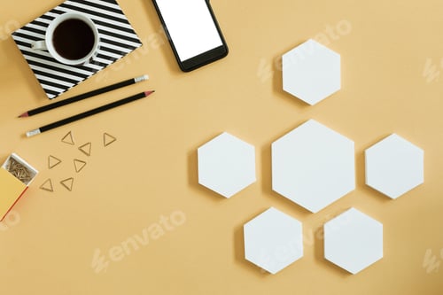Preview: Colourful composition of workspace with hexagons as copy space and stylish office accessories.