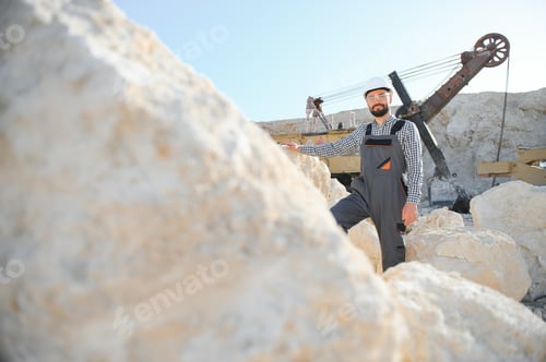 Preview: Male worker with bulldozer in sand quarry