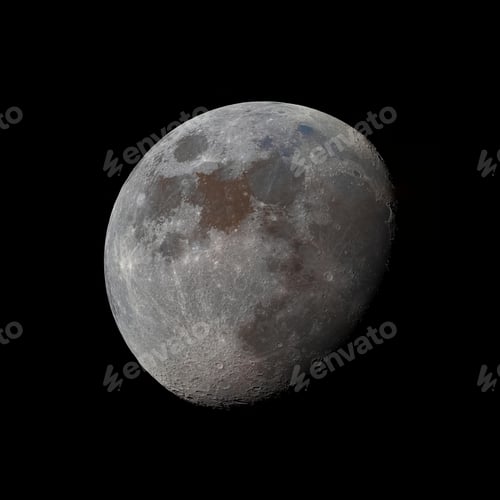 Preview: Vertical shot of the moon in the dark sky. Waning Gibbous.