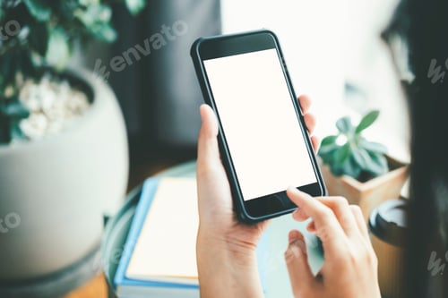 Preview: Close up of woman hand holding smart phone.