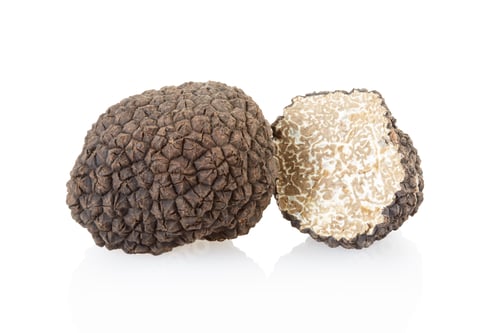 Preview: Black truffle and section isolated on white, clipping path included