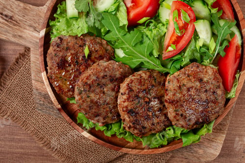 Preview: Fried cutlets, mixed minced meat, with vegetable salad, homemade, top view, no people,