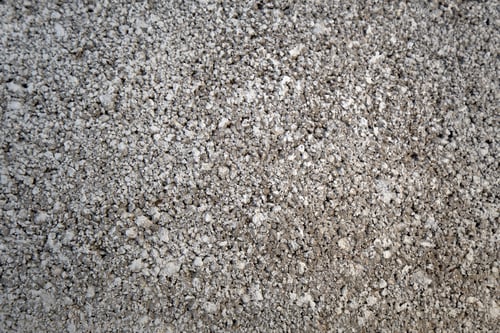 Preview: High angle shot of a grey rough cement surface