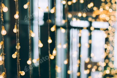 Preview: Abstract blurred of blue and silver glittering shine bulbs lights background. Xmas holiday backdrop