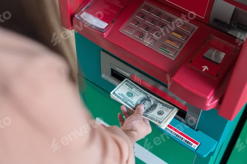 Preview: Top view of Closeup woman withdrawing the cash via ATM, business Automatic Teller Machine concept