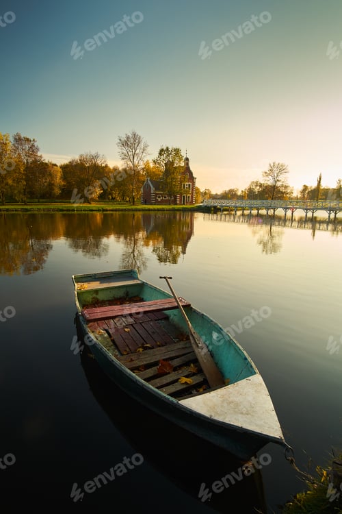 Preview: Boat on autumn lake