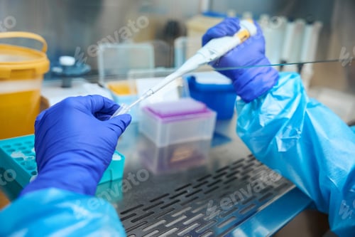 Preview: Specialist analyzes biomaterial in a sterile room