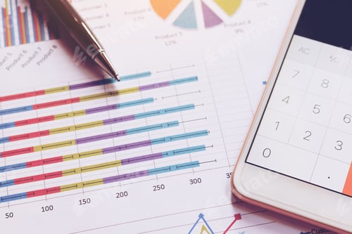 Preview: Data analyzing with calculator in smart phone and pen on charts and graph.