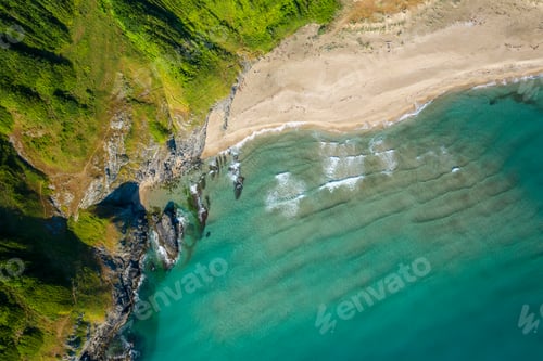 Preview: Picturesque rocky coastline with sandy beaches and green forests