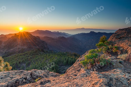 Preview: Sunrise over Mountainous Landscape