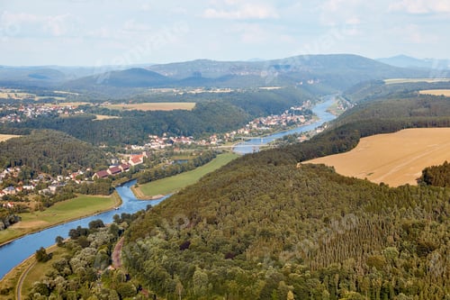 Preview: aerial view of beautiful elbe river, forest and Bad Schandau town in Germany