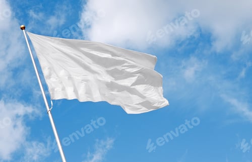 Preview: White flag waving in the wind against cloudy sky
