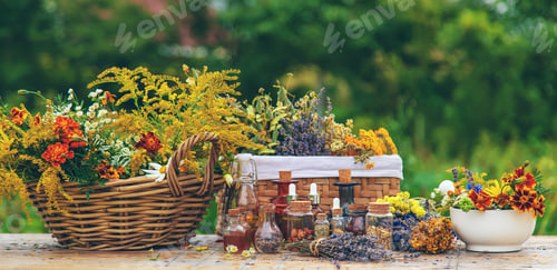 Preview: Medicinal herbs and tinctures on the table. Selective focus.