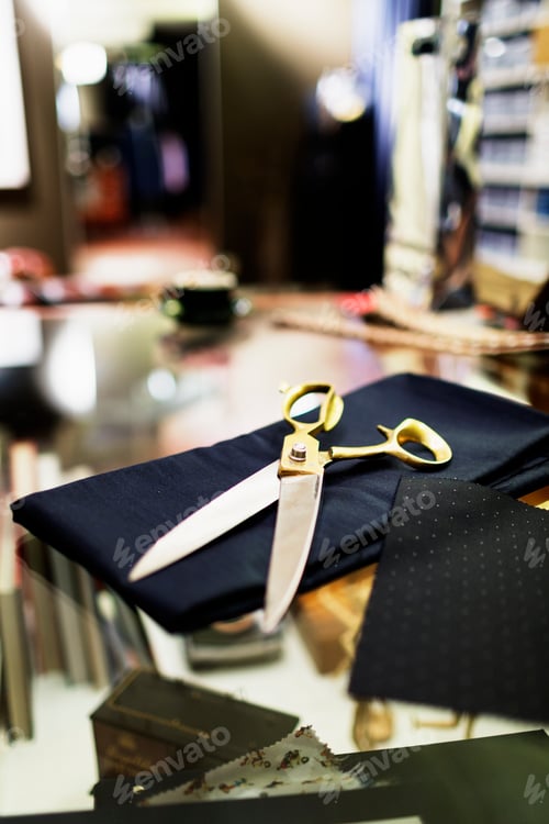 Preview: Scissors on fabric in clothing store