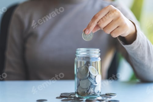 Preview: Saving Money into a Glass Jar Container